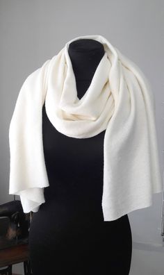 Warm ivory shawl made of high quality and soft angora to add an elegant touch to your everyday look or a special occasion, wedding, party. Beautiful shawl to to warm you up on a cold but beautiful day. For more wedding tops and boleros, please access https://www.etsy.com/shop/LidiasBoutiqueDesign?ref=seller-platform-mcnav&section_id=23157300. For more wedding dresses, please access https://www.etsy.com/shop/LidiasBoutiqueDesign?ref=seller-platform-mcnav&section_id=23157290. For more wedd One Size Wedding Shawl Scarf, Cashmere Scarf Wrap Shawl, Elegant Solid Color Cashmere Shawl, Elegant Winter Scarves One Size, Elegant One Size Winter Scarves, Elegant One-size Winter Wraps, Elegant One Size Winter Wraps, One Size Elegant Winter Scarves, Elegant One-size Winter Wrap