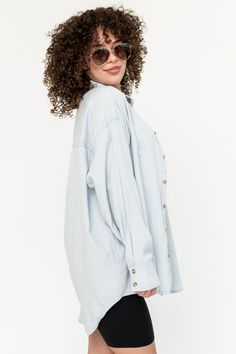 Lightweight chambray material Oversized fit Longer length Drop sleeve Versatile style Styled with Layering Tank & Cove Biker Shorts If between sizes consider sizing down *OUT OF STOCK? Select your size & sign up for restock notifications. Fabric: 100% Cotton Wash/Care: Gentle cycle cold, line dry. TRY ON VIDEOS MEASUREMENT & FIT MODEL INFO Oversized Tops For A Day Out, Relaxed Fit Light Wash Tops With Buttoned Pockets, Light Wash Relaxed Fit Top With Buttoned Pockets, Light Wash Tops With Buttoned Pockets And Relaxed Fit, Oversized Cotton Tops With Snap Buttons, Fall Chambray Button-up Denim Top, Light Wash Long Sleeve Denim Top For Day Out, Relaxed Fit Light Wash Top With Buttons, Light Wash Relaxed Fit Top With Buttons