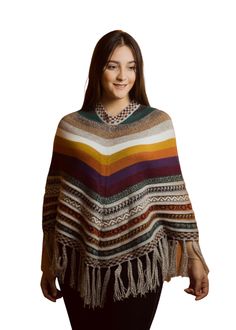 Looking for a gift that will make you feel special? For that good friend or someone special Beautifully woven, incredibly soft, and silky-smooth texture. Our warm alpaca wool poncho, is sure to chase the winter blahs away, available in different colors! Hand-made in Perú by Awki Alpaca and her team of artisans. They put years of creativity and high-quality work into each of their beautiful designs. You won’t be just wearing a fashionable piece, but also some of Peru’s treasures and mysteries, re Bohemian Alpaca Cape For Fall, One Size Alpaca Poncho, Multicolor One Size Poncho For Fall, One Size Multicolor Poncho For Fall, Multicolor Shawl Poncho For Fall, Multicolor Cape Poncho For Fall, Cozy Alpaca Poncho For Fall, Cozy Alpaca Shawl, Alpaca Shawl For Fall