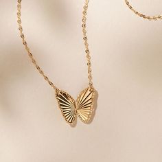 Butterfly Pendant in 14K Yellow Gold (18 in) | Shane Co. Luxury Yellow Gold Butterfly Charm Jewelry, Luxury Yellow Gold Jewelry With Butterfly Charm, Delicate Yellow Gold Butterfly Pendant Necklace, 14k White Gold Butterfly Charm Necklace, Luxury Yellow Gold Necklace With Butterfly Charm, 14k White Gold Necklace With Butterfly Charm, Luxury Yellow Gold Butterfly Necklace, Elegant 14k Gold Butterfly Jewelry, Elegant Yellow Gold Butterfly Jewelry