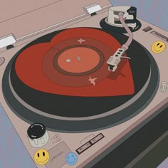 an old record player with smiley faces on the side and red vinyl in its turntable