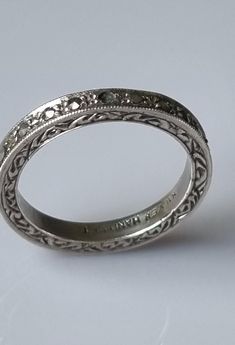 A beautiful antique French 800 silver and Solitaire paste ring. The outer shank is stamped with the French assay mark - crab. Small 800 silver items. The paste is wonderful and quite large measuring 8mm in diameter. Good condition. The shank has some scratches on the inside. Ring size: US: 6 1/2 UK: M Heirloom Rings With Decorative Round Band, Victorian Engraved Ring With Decorative Band For Anniversary, Vintage Oval Engraved Diamond Ring, Vintage Engraved Oval Diamond Ring, Vintage Engraved Round Diamond Ring, Heirloom Stackable Rings With Decorative Band, Silver Stackable Rings With Rose Cut Diamonds For Anniversary, Antique Engraved Ring With Decorative Band For Anniversary, Vintage Engraved Diamond Ring