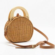 Casual Cream Handheld Bucket Bag, Casual Beige Bags With Braided Handles, Casual Beige Bag With Braided Handles, Cream Handheld Satchel For Summer, Casual Beige Shoulder Bag With Braided Handles, Light Brown Woven Bags For Summer, Casual Handheld Satchel For Summer, Casual Woven Light Brown Shoulder Bag, Casual Brown Handheld Straw Bag