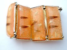 Statement Jewelry - This is a wide gold tone vintage bracelet with lucite confetti panels. It is 7.25" long, 2" wide, slight plating loss around the clasp,. Lucite Bracelets, Vintage Bracelet, Bracelet Vintage, Vintage Bracelets, Statement Jewelry, Confetti, Gold Tones, Plating, Bracelet