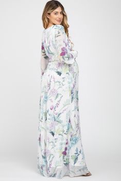 A stylish maternity dress perfect for cocktail parties and special occasions.  A floral, chiffon maternity maxi dress featuring long, cuffed sleeves with buttons, a cinched elastic waist, pleated details, a waist tie, and a v-neckline. Double lined to prevent sheerness. The White Floral Chiffon Long Sleeve Pleated Maternity Maxi Dress is perfectly bump-friendly! Flowy Modest Maternity Maxi Dress, Spring Floral Print Maternity Maxi Dress, Spring Maternity Maxi Dress With Floral Print, Spring Maternity Wear Floral Print Maxi Dress, Flowy Long Sleeve Maternity Maxi Dress, Flowy Long Sleeve Maxi Dress For Maternity, Modest Maternity Maxi Dress For Spring, Feminine Floral Print Maternity Maxi Dress, Feminine Maternity Maxi Dress With Floral Print