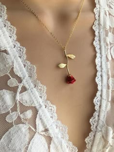 $17 - $34 · Original Red Rose Necklace, Beauty and the Beast Necklace,Anniversary Gift, Personalized Bridesmaid gift, Initial Necklace This dainty Long Stemmed Red Rose Necklace is plated in 24kt gold. Hand… Red Rose Design Flower Pendant Jewelry, Rose Necklace Gold, Rose Beauty And The Beast, Collar Rosa, Jewelry Diamonds, Personalized Bridesmaid Gifts, Rose Pendant, Rose Necklace, Bridesmaids Personalized