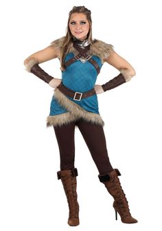 a woman in a costume that is wearing boots and holding her hands on her hips