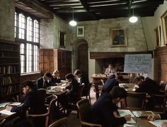 an old school classroom with students sitting at their desks