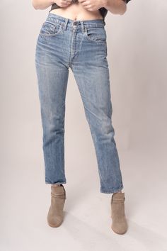 Perfectly faded medium wash 80's Levi’s selvedge high rise jeans. Waist 27”Rise 10.75”Hips 39”Inseam 29” Model’s Measurements:Height 5’9”Chest 34”Waist 29”Hips 36.5” Excellent vintage condition, with normal wear and condition for its age.For international shipping rates, please send inquiries to our CONTACT page. Faded Straight Leg Cropped Jeans In Recycled Denim, Faded Cropped Leg Jeans In Recycled Denim, Faded Rigid Denim Cropped Jeans For Everyday, Faded Recycled Denim Jeans For Fall, Faded Cropped Jeans With Five Pockets, Faded Cropped Leg Recycled Denim Jeans, Classic Faded Jeans With Frayed Hem, Classic Faded Denim Cropped Jeans, Classic Faded Jeans For Everyday Wear