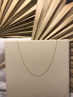 This dainty chain is perfect to add charms onto, to wear on its own, or to stack with multiple chains. This chain is solid 14k yellow gold and can be worn in water and slept in without any damage. We offer more than one size: - 16 inch - 18 inch - 20 inch - 22 inch Hand written notes and gift wrap available upon request. Thank you for looking at our shop!! With love, Kelly Written Notes, Small Gold Hoop Earrings, Small Gold Hoops, Dishwasher Soap, Dainty Chain, Hand Written, Pinky Ring, Single Earring, Gold Hoops