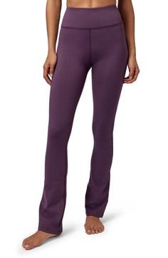 Cut from the brand's smooth, soft and lightly compressive knit, these pants have a body-hugging fit and a feel that'll have you strutting like a supermodel. 29 1/2" inseam; 17" leg opening; 11" front rise; 12" back rise (size Medium)     Pull-on style     Hidden back cell phone pocket     Moisture-wicking fabric engineered for dryness and comfort     Antimicrobial fabric engineered to inhibit the growth of odor-causing germs     71% recycled polyester, 29% elastane     Machine wash, tumble dry High Stretch Mid-rise Elastane Pants, High Stretch Elastane Mid-rise Pants, Seamless Fitted Mid-rise Bottoms, Sleek Sports Bottoms In Elastane, Soft Touch Elastane Yoga Pants, Fitted Solid Color Bottoms With Soft Touch, Fitted Solid Color Soft Touch Bottoms, Compressive Bottoms With Ribbed Waistband For Pilates, Compressive High-cut Leg Elastane Pants