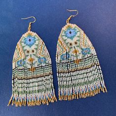 Beautiful and glamorous boho style fringe earrings will elevate your look instantly. It is handmade and handwoven with the high quality 11' size Japanese Miyuki Delica glass seed beads and durable nylon thread (conditioned with bee wax), has the 925 sterling silver gold covered ear wire closures. Bright and happy colors and lightweight design look amazing in any light!  Handmade with love in Charlotte, NC Length: 4 Inch , comes in a box, securely packaged.  Shipping within the US is free International shipping cost is based on the destination and will be calculated by Etsy at the Check out Large Statement Earrings, Beaded Earring, Loom Pattern, Boho Fringe, Earring Ideas, Native American Beading, Earrings Beaded, Beaded Dangle Earrings, Seed Bead Earrings