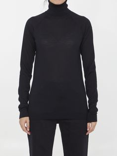 Vas turtleneck crafted from black wool,silk and cashmere with knitted design. Slim fit. The model is 180cm tall and wears size S. Size nationality: US Product number: 2656781 Product code: ARMTMKN04WS02002 Composition: 70% virgin wool, 20% silk, 10% cashmere Knitted Design, Platform Wedge Heels, Cashmere Color, Premium Brands, Dress With Cardigan, Clothes Collection, Cardigan Jacket, Black Wool, Luxury Boutique