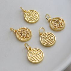 Material: Brass Description High quality 14K gold plated brass, color not easily tarnish Size: 13mm, thick 2.1 mm Quantity: 5 pcs. Color: 14K gold Material: 14K gold plated brass ❤ More pendants items here: ❤ https://www.etsy.com/hk-en/shop/basicDIYcraftstore?ref=simple-shop-header-name&listing_id=806990990&section_id=29121362 ❤ More other items here: ❤ https://www.etsy.com/shop/basicDIYcraftstore?ref=simple-shop-header-name&listing_id=823835581 Shipping Following is the place that o Gold Round Charms For Jewelry Making, Gold Plated Pendant Charms, Gold Round Pendant Charms For Good Luck, Gold-plated Tarnish Resistant Charms, Tarnish Resistant Gold Plated Round Pendant Charms, Gold Coin Pendant Charms, Gold Good Luck Charms In 14k, Gold Engraved Charms For Good Luck, Gold Engraved Good Luck Charms