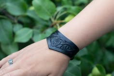 "This witchcraft black bracelet will help you immerse yourself in a dark fairy tale! It will decorate Dark Mori and Forest Witch looks. It will really suit your gothic and wiccan style. The leather bracelet looks elegant on a woman's hand and has a size adjustment. Add magic to your life!  You can change the size of the bracelet: you need to unscrew the button and move it to another hole. Wrist size 1: 6.3\" (16 cm) - 7.4\" (19 cm) Wrist size 2: 7.4\" (19 cm) - 9.8\" (25cm) If you would like a s Bracelet En Cuir Diy, Dark Fairy Tale, Celtic Wedding Dress, Witch Bracelet, Wicca Jewelry, Goddess Bracelet, Celtic Bracelet, Diy Leather Bracelet, Forest Witch