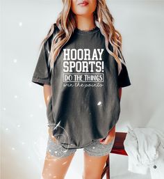 Hooray Sports Shirt AT CHECKOUT: ▪️ Shirt Color(Shown in Pepper) ▪️ Size ▪️ Design Color SHIRT INFO: ▪️ Comfort Color heavy blend shirts ▪️ All shirts are unisex fit. Please refer to the size chart provided in the listing photos for more details. ▪️ For oversized look please size UP 1-2 sizes ▪️ Unisex, 6.1 oz, 100% ring spun cotton, garment-dyed, DESIGN INFO: ▪️ Design is heat transfer vinyl and is applied to each shirt with a commercial grade heat press. ▪️ There may at times be a slight diffe Go Sports Shirt, Sporty Athletic Heather T-shirt For Sports, Sporty T-shirt With Team Name For Gym, Moisture-wicking Shirt For Sports Events And Seasons, Moisture-wicking Shirt For Sports Events, Sporty Team Name T-shirt For Workout, Sports Fan Tops For Sports Season Events, Sportswear Tops With Team Name For Sports, Sports Season Graphic Print Shirt