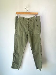 The Great Green Pants! Super soft cotton blend with a button fly and high rise waist. Made in USA. Marked a size 26, but fit larger, please refer to measurements. In excellent condition! Approx. Measurements: Waist: 32" Rise: 12" Inseam: 25" High Waist Cotton Utility Work Pants, High Waist Utility Cotton Work Pants, Cotton Straight Leg Pants With Button Zip Fly, High Waist Utility Cotton Pants, Relaxed Fit Mid-rise Pants With Button Closure, Mid-rise Relaxed Fit Pants With Button Closure, Relaxed Fit Cotton Work Pants With Button Closure, Mid-rise Cotton Pants With Patch Pockets, Tapered Cotton Bottoms With Belt Loops