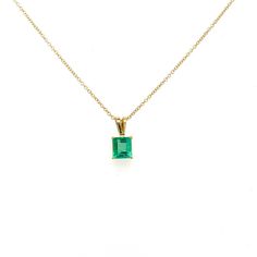 "This solitaire pendant showcases a beautiful square emerald cut Colombian Emerald held by 4 prongs in 18K yellow gold. The pendant length is 13.5mm, and in total the pendant weighs 1.5 grams.  Comes with a 14k gold cable chain of 1mm and 18 inches.  Item Details: - Type: Pendant  - Metal: 18K Yellow Gold  - Weight: 1.5 grams  - Style: Minimalist  - Era: 21st Century  - Setting: Prong  - Size: 13.5mm length  Emerald Details: - Carat: 1.20  - Cut: Emerald  - Color: Green  - Origin: Colombia  - Me Yellow Gold Necklace With Emerald Rectangular Pendant, Classic Emerald Pendant Necklace With Diamond Cut, Classic Emerald Diamond Cut Pendant Necklace, Classic Diamond Cut Emerald Pendant Necklace, Luxury Emerald Square Pendant Necklace, Formal Emerald Rectangular Pendant Jewelry, Classic 14k Gold Emerald Cut Emerald Necklace, Fine Jewelry Emerald Cut Emerald Necklace For Formal Events, Rectangular Solitaire Emerald Jewelry