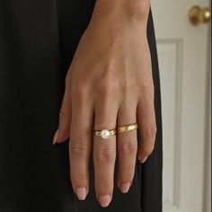 Our bold pearl ring is a gorgeous freshwater pearl statement ring on a lightly hammered band. Just the right size to make a statement but minimal enough for every day. You will reach for this ring all the time. Made with genuine fresh-water, high-luster pearls 14k gold filledBand width: 3 mmPearl size: 6 - 7 mm Pearl grade: AA Made to order. Please allow 7 business days for processing. Pearl Ring Settings, Pearl Rings In Gold, Gemstone Stacking Ring, Necklace Styles, Canadian Jewelry, Rings In Gold, Cute Necklaces, Gold Pearl Ring, Pearl Rings