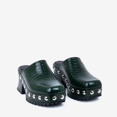 Classic closed-toe clog with wraparound chrome studs. The rubber-bottomed ayous-wood outsole is grippy, lightweight, and flared at the heel. End Of Season Sale, Shoe Lover, Wrap Around, Clogs, Emerald, Skin, Heels, The Originals