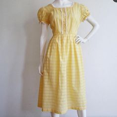 Bust: 42-44” Waist: 32-33” Hips: Free Length: 45” Excellent Condition, But Missing A Few Rhinestone Details In The Front Buttons. Yellow Retro Vintage Dress For Garden Party, Yellow Cotton Retro Vintage Dress, Retro Yellow Dress For Picnic, 1950s Style Yellow Vintage Dress For Spring, 1950s Style Vintage Yellow Dress For Spring, Yellow Vintage Dress 1950s Style For Spring, Yellow Vintage Dress, 1950s Style For Spring, Knee-length Yellow Vintage Summer Dress, Knee-length Yellow Vintage Dress For Summer