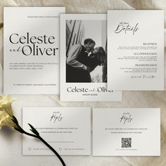 the wedding stationery is laid out on top of each other, with a yellow flower