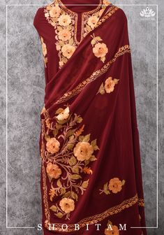 Item: Custom Stitched Kameez, Bottom and Dupatta Set A stunning 3 piece suit in flowy and form flattering georgette in a striking shade of maroon is decorated with colorful aari embroidery. This piece is made in Kashmir and the motifs are reminiscent of the natural beauty of the region. There is heavy work around the yoke, buttas in the front and a stunning dupatta. This suit will be made as per your measurements and choice of fitting. The front neckline can be a round or keyhole so it pairs wel Traditional Nida Dupatta With Intricate Embroidery, Red Georgette Sharara With Chikankari Embroidery, Red Chikankari Embroidered Sharara In Georgette, Festive Unstitched Georgette Suit In Traditional Drape, Red Designer Unstitched Georgette Suit, Festive Unstitched Georgette Suit, Anarkali Style Burgundy Dupatta With Resham Embroidery, Burgundy Anarkali Dupatta With Resham Embroidery, Bollywood Burgundy Dupatta With Zari Work