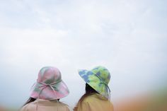 Looking for a must-have summer hat? This wide-brimmed hat will keep you cool and comfortable on any summer day. Even better, the reversible design makes it double the fun! One size100% Polyester Playful Sun Hat With Upf 50+ For Beach, Multicolor Bucket Hat For Spring Outdoor, Spring Multicolor Bucket Hat For Outdoor, Playful Upf 50+ Sun Hat For Beach, Playful Blue Bucket Hat For Outdoor, Lightweight Bucket Hat For Summer Sunbathing, Playful Bucket Hat With Upf 50+ And Curved Brim, Casual Bucket Hat With Uv Protection For Sunbathing, Lightweight Bucket Hat For Sunbathing In Summer