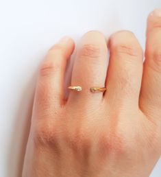 "★ ★ ★ Made with solid gold to ensure the strength of the ring.★ ★ ★ This diamond cuff ring, part of our \"Minimal Collection\" is a delicate, fashion piece to wear as well as an index ring or knuckle ring. Use as a standalone piece or with stacking rings. Item Details ❤ Made to Order ✔ Available Gold Color: Rose Gold, Yellow Gold, White Gold, ✔ Number of Diamonds: 2, total carat weight: 0.04Ctw, ✔ Diamond Color: G Color ✔ Diamond Clarity: VS ✔ Band details: Top Width: 2.4mm Thickness: 3.0mm Bot Diamond Open Midi Rings For Promise, Diamond Open Ring Midi Rings For Promise, Adjustable Open Ring With Single Diamond, Stackable Open Rings With Single Cut Diamonds For Gift, Stackable Open Rings With Single Cut Diamonds As Gift, Recycled Gold Open Ring For Promise, Single Cut Diamond Stackable Open Rings As Gift, Open Ring With Single Diamond, Yellow Gold Open Stackable Promise Rings