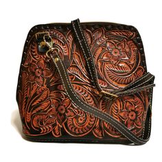 Hand Tooled Leather Bag Featuring a gorgeous chiseled artisan design, this rustic  Hand Tooled Leather Bag will help you bring a little vintage flair to your everyday outfit. The perfect size for fitting all of your everyday essentials, this purse was actually handmade with love and care by talented artisans , giving it a rustic touch that's hard to find in stores.  Crafted from genuine cowhide leather and best for casual and everyday wear.  💮 Measures: 🌹height: 17 cm. 7 inch 🌹width : 18 cm. Vintage Brown Hand-tooled Shoulder Bag, Vintage Brown Embossed Shoulder Bag, Vintage Engraved Bags For Everyday Use, Traditional Engraved Rectangular Shoulder Bag, Traditional Engraved Rectangular Bags, Vintage Brown Hand Tooled Bag For Everyday Use, Vintage Brown Hand Tooled Rectangular Shoulder Bag, Vintage Engraved Shoulder Bag For Daily Use, Vintage Brown Rectangular Hand Tooled Shoulder Bag