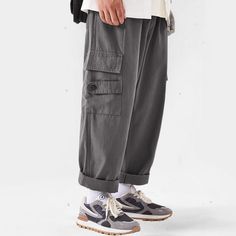 Experience timeless style and versatility with our Classic All-Match Straight-Leg Cargo Pants. Made with high-quality materials, these pants offer a comfortable fit and effortless elegance. With their straight-leg design and functional cargo pockets, they are perfect for any occasion. Elevate your wardrobe with this luxurious and essential piece. Features: -85% Cotton,15% Polyester -Mid-rise waist -Multi-Pockets -Regular Fit -Japanese style Leg Design, Effortless Elegance, Japanese Style, Timeless Style, Cargo Pants, Black Pants, Timeless Fashion, Mid Rise, Comfort Fit