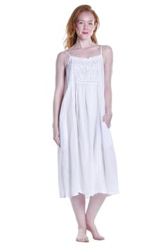 This unlined sleeveless dress from La Cera is beautifully styled with an embroidered detail bib yoke. It features two (2) side pockets and pleated details that continue down the bodice finishing this look of breathable cotton dress. This stylish nightgown is sure to add comfort and style to your wardrobe. Style: Nightg Cotton Sleepwear, Sleeveless Gown, Wardrobe Style, Nightgowns, Wholesale Clothing, Cotton Dress, Cotton Dresses, Nightwear, Night Gown