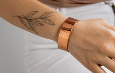 Elevate your style with our handcrafted plain copper bracelet, designed to blend minimalist charm with timeless elegance. This adjustable bangle is meticulously crafted from pure copper, offering a sleek and modern touch to any outfit. 🌟 🔹 Customizable and Unique: Our bracelet is fully customizable to ensure a perfect fit and a unique touch. Whether you're looking to gift someone special or add a personal accessory to your collection, this piece is designed just for you. 🔹 Minimalist Unisex D Adjustable Simple Cuff Bracelet As Gift, Elegant Copper Bracelet As A Gift, Handmade Minimalist Cuff Bracelet For Everyday, Elegant Copper Bracelets As Gift, Everyday Minimalist Handmade Cuff Bracelet, Minimalist Rose Gold Copper Jewelry, Minimalist Adjustable Cuff Bracelet As Gift, Adjustable Minimalist Cuff Bracelet For Gift, Rose Gold Copper Bracelet As A Gift