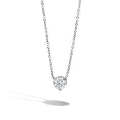 An elegant 1ct round solitaire diamond pendant with G-H color and I1 clarity hangs on a beautiful 18K white gold dainty chain. White Gold Platinum Necklace With Brilliant Cut, White Gold Necklaces With Brilliant Cut In Platinum, Elegant Solitaire Diamond Necklace With Lab Grown Diamond, Elegant Solitaire Diamond Necklace With Lab-grown Diamond, Elegant Solitaire Lab-grown Diamond Necklace, Sterling Silver Solitaire Necklace For Formal Occasions, Classic White Gold Solitaire Necklace With Lab Grown Diamond, Luxury Sterling Silver Solitaire Necklace In Diamond White, Classic Platinum Solitaire Necklace With Vvs Clarity