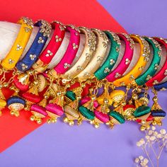 Elevate your style with our exquisite Indian Silk Thread Bangles. Expertly handcrafted with luxurious silk thread and adorned with stunning Kundan bangles, these ethnic bracelets add a touch of elegance to any outfit. Perfect for Indian weddings, these assorted Kangan with Latkan are the epitome of fashion and luxury. Free size for a comfortable fit. Material: Plastic, Silk Thread and Kundan Size: Designed as free size, these bangles offer versatility and ease of wear for women of different wris