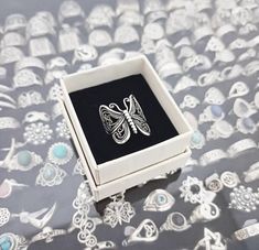 Our ring is a delicate and elegant jewel that combines the beauty of 925 sterling silver with the symbolism of the butterfly. Silver, known for its shine and durability, represents purity and clarity. The butterfly, on the other hand, is a symbol of transformation and rebirth. When you wear a butterfly-shaped ring you convey a special message. The butterfly symbolizes the process of change and personal development. Her transformation from a caterpillar to a beautiful butterfly represents overcom Silver Butterfly Ring, Process Of Change, Butterfly Ring, Silver Butterfly, Ring Sterling Silver, Beautiful Butterflies, Sterling Ring, Rings Statement, Personal Development