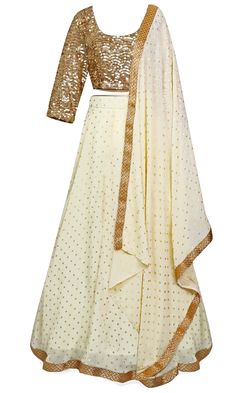 The lehenga skirt is crème in color, and the long-sleeve blouse is completely covered in gold sequins. Festive Gold Georgette Sets, Festive Embellished Beige Sharara, Festive Beige Embellished Sharara, Elegant Sequined Lehenga For Festivals, Gold Long Sleeve Party Wear Sets, Festive Embellished Beige Sets, Gold Sharara With Sheer Dupatta And Long Sleeves, Gold Long Sleeve Sharara With Sheer Dupatta, Elegant Party Lehenga With Gota Work