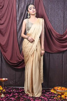 Beige pre-draped saree with polka dot printed base. Comes with mirrorwork embellished bead tasselled padded blouse. - Aza Fashions Pre-draped Wedding Saree With Zari Work, Pre-draped Saree For Wedding And Festivals, Pre-draped Saree For Wedding And Festive Occasions, Festive Pre-draped Saree For Wedding, Festive Draped Tissue Silk Saree, Pre-draped Festive Saree For Reception, Pre-draped Saree For Reception And Festive Occasions, Pre-draped Saree With Zari Work For Designer Wear, Wedding Art Silk Draped Saree