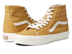 Vans Sk8-Hi Tapered - Shoes : (Eco Theory) Mustard Gold/True White : Heritage skate style gets updated in a sleek, slender design with the Vans Sk8-Hi Tapered sneakers! A deconstructed version of the classic high-top skate shoes in a slimmed-down, fitted silhouette. Uppers of sturdy canvas with checkerboard print. Padded collar and footbed for added comfort, fit and superior shock absorption. Iconic sidestripe detail. Vulcanized construction: • Slimmed-down profile offers a flexible feel. • Gum Trendy Canvas High-top Sneakers With Gum Sole, Fall High-top Sneakers With Contrast Sole For Streetwear, Fall High-top Sneakers With Gum Sole And Lace-up, Vans Urban High-top Sneakers With Contrast Sole, Urban Vans High-top Sneakers With Contrast Sole, High-top Sneakers With Gum Sole, High-top Sneakers With Gum Sole For Fall, Fall High-top Sneakers With Gum Sole, Canvas High-top Sneakers With Contrast Sole For Skateboarding