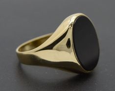 A timeless statement piece! Our elegant Real Solid 14K Yellow Gold 17mm Oval Close Black Onyx Signet Ring 6gr ALL Sizes is the perfect way to add a touch of sophistication to any look. The solid gold band and 6gr weight deliver quality and durability, while the close black onyx adds a subtle touch of drama. Available in all sizes, this ring will make an unforgettable impression.  Specifications: Metal: Real 14K Yellow Gold (Stamped, 14K) Condition: Brand New Polished: Shiny Weight: 6.0 grams Wid Gold Ring Men, Gold Ring For Men, Unique Gold Rings, Onyx Signet Ring, Vintage Engagement Rings Sapphire, Mens Gold Rings, Jewelry Real, Solid Gold Band, Ring Men