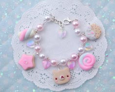 .**o**.✰*o¨oº*. 🎀 D E S C R I P T I O N 🎀 .*ºo¨o*✰.* Super sweet and kawaii bracelet composed by a bracelet of handlinked beads, they have a pink/purple/blue gradient effect! The charms are little acrylic stars, mini acrylic cristals, an enamel sakura flower and 4 big polymer clay cabochons! .**o**.✰*o¨oº*. 🎀 S H I P P I N G 🎀 .*ºo¨o*✰.* Shipping is 5€ airmail without tracking number worldwide. Italia: raccomandata If you need a tracking number, just add this listing to your order: https://w Kawaii Bracelet, Pastel Kidcore, Fake Sweets, Candy Bracelet, Rose Violette, Candy Jewelry, Sakura Flower, Kawaii Jewelry, Kawaii Accessories