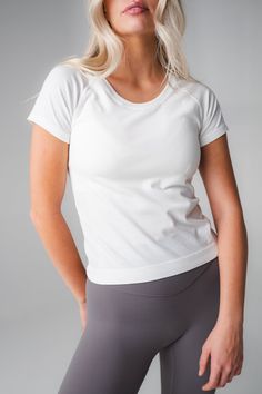 Our Energy Tee is designed for high performance activities as well as for on the go. This seamless short sleeved tee is fitted yet flexible and hits at the top of the waistband. Breathable Relaxed Fit T-shirt For Athleisure, Breathable Short Sleeve T-shirt For Light Exercise, Fitted Breathable T-shirt For Athleisure, High Stretch Athleisure T-shirt For Workout, Short Sleeve T-shirt For Workout, Athleisure Compression Crew Neck T-shirt, High Stretch Go-dry Crew Neck T-shirt, Functional Breathable T-shirt For Light Exercise, Sporty Athletic Fit T-shirt For Light Exercise