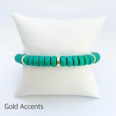 Made from dyed wood beads and golden accents, our Tropicalia Collection bracelets will have you dreaming of white sand beaches and ocean breezes every time you wear them! Bracelet measures approx. 7" in circumference. If you need a custom size, please send an email to hello@belleandten.com. For more styles in this collection, click here. Adjustable Turquoise Beaded Bracelets With Wooden Beads, Adjustable Turquoise Bracelets With Wooden Beads, Spiritual Wooden Beads Bracelets For Beach, Beach Beaded Bracelets With Wooden And Heishi Beads, Turquoise Beaded Bracelets With 8mm Beads For Beach, Gold Beaded Bracelets For Vacation, Gold Bracelets With 8mm Beads For Beach, Gold Bracelets With Round Beads For Vacation, Beach Bracelets With Gold Beads