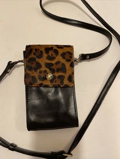 Patricia Nash Brown Leopard Crossbody Bag Leather phone purse New. Condition is "New without tags". Shipped with USPS Priority Mail. fits a phone, mask, lipstick and money.  All you need. Super cute and nicely made.  I just have too many items in my collection and need to move some along to new homes. I bought this from HSN myself and never carried. Trendy Phone Bag With Hidden Sleeve For On-the-go, Trendy Wallet With Mobile Phone Bag, Trendy Portable Rectangular Phone Bag, Brown Phone Bag With Cell Phone Pocket For On-the-go, Everyday Phone Bag Clutch With Cell Phone Pocket, Trendy Rectangular Wallet With Mobile Phone Bag, Everyday Phone Bag With Cell Phone Pocket, Daily Use Phone Bag With Removable Pouch, Brown Bag With Hidden Phone Sleeve For On-the-go