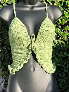 Made to order crochet top with your bra size and your shirt size. When you place the order, I'll get in contact with you to get all your size information. You can pick a color and how you like the straps to tie. I'm a teacher so I work full time, and this is my hobby, so I decide to start selling in my spare time. It should take 2-5 days to make then shipping takes 4-5 days depending on where you live. Crochet 90s, Green Y2k, Green Corset, Pick A Color, Crochet Fringe, Crochet Bralette, Crochet Style, My Hobby, Yarn Sizes