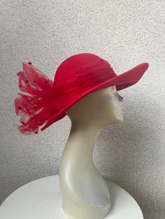 Vintage formal hat brim boater red wool felt with red netting tulle by Adolfo II NY Paris sz 23". Good condition has some wear with several 7 spots worn ( last photo, hard to see. Made in USA  Size crown height 4"  Crown width 8" Total width 14" Brim width 3-4" Red Fitted Top Hat For Winter, Brimmed Felt Hats For Kentucky Derby, Winter Party Boater Hat With Short Brim, Red Brimmed Top Hat For Winter, Red Fedora Mini Hat For Party, Elegant Fitted Red Felt Hat, Red Fitted Mini Hats For Winter, Kentucky Derby Flat Brim Felt Hat, Winter Party Boater Hat With Curved Brim