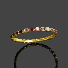 Bangle Size:  All Size Available Stone Size  :  5 X 9 mm Weight: 18 gm Color: Multi Color Material: Brass Natural Ruby & Polki Bracelet \ Gemstone Bangle \ Minimal Bracelet \ Dainty Bangle \ Vintage Bangle \ Multi Stone Bangle \ Gifts For Mother . Contact us for wholesale prices. R I N G S https://www.etsy.com/in-en/shop/GemFormingStudio?section_id=22783374 B E A D S https://www.etsy.com/in-en/shop/GemFormingStudio?section_id=22828835 W A N D S https://www.etsy.com/in-en/shop/GemFormingStudio?se Adjustable Bangle Bracelet With Gemstones, Adjustable Round Crystal Bracelet With Jewels, Adjustable Jeweled Crystal Bangle Bracelet, Adjustable Crystal Bangle Bracelet With Jewels, Elegant Adjustable Bangle With Stones, Dainty Crystal Bangle For Party, Party Bracelets With Stone Setting, Party Stackable Bangle Jewelry, Dainty Stackable Round Bangle