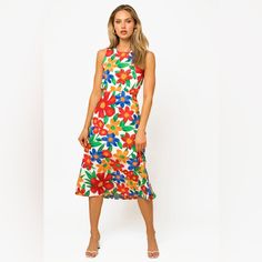 This Midi Dress Features A Vibrant Tropical Floral Print, Perfect For A Fun And Girly Look. The Crew Neckline And Sleeveless Design Provide Comfort, While The Elasticized Waist Creates A Flattering Fit. The Open Back With Button And Lace Down Closure Adds An Eye-Catching Detail. Lined For Coverage, This Non-Stretchy Dress Is Cute And Playful. Materials 100% Polyester Lining: 100% Polyester Made In Guatemala Medium: Length: 50", Bust: 28" True To Size White Printed Midi Dress, Red Floral Print Midi Dress For Garden Party, White Floral Midi Sundress, White Printed Midi Dress For Garden Party, White Printed Sundress Midi Dress, Sleeveless Tropical Print Midi Dress For Garden Party, Multicolor Floral Print Midi Sundress, Red Midi Sundress For Garden Party, Sleeveless Multicolor Tropical Print Midi Dress