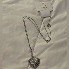 New With Tags. Long Necklace. Looks Great With Sweater. Silver Jewelry Elegant Metal Heart Necklace With Heart Beads, Elegant Metal Heart Beads Necklace, Elegant Metal Heart Cut Necklace, Elegant Heart Cut Metal Necklace, Elegant Heart Cut Metal Heart Necklace, Charming Charlie, Outfit Inspo Fall, Soft Girl, Heart Pendant Necklace