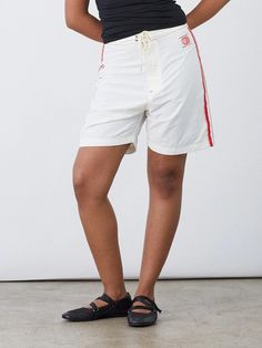 Made Some Long Shorts - Cream & Red – Lisa Says Gah White Swim Trunks With Built-in Shorts, Sporty Cotton Bottoms For Warm Weather, Summer Streetwear Knee-length Athletic Shorts, White Nylon Athletic Shorts With Short Leg, Spring White Nylon Athletic Shorts, White Nylon Athletic Shorts For Spring, Sporty Cotton Swim Trunks For Spring, Athleisure Swim Trunks For Summer Streetwear, White Relaxed Fit Nylon Shorts